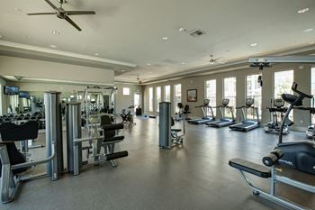 24-Hour premium fitness center with cardio, trx training zone and strength training equipment